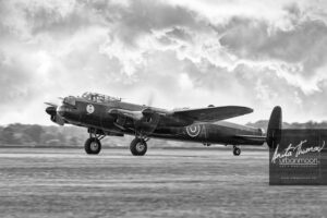 Aviation photography - The Avro Lancaster Mk. X of the Canadian Warplane Heritage Museum in Hamilton, Ontario taxis on the runway. It is one of only two remaining flying Lancs.
(C)Anita Thomas All Rights Reserved. avro lancaster mk x