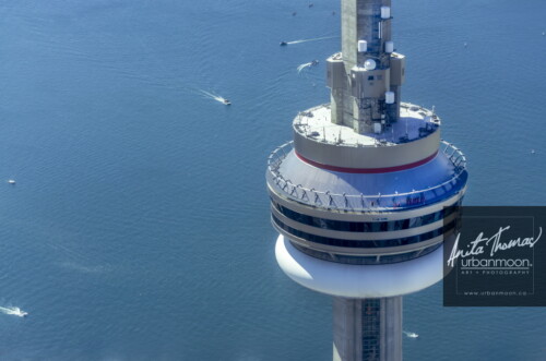 Aerial destinations - People are busy this beautiful July morning. Many boaters on the water and edgewalkers on the CN Tower in Toronto, Ontario.
© Anita Thomas - Urbanmoon. All Rights Reserved. aerial cn tower toronto ontario