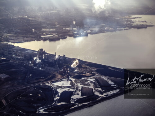 Aerial photography – The city of Hamilton can be seen beyond the haze of the industry upon which it was built.
© Anita Thomas - Urbanmoon. All Rights Reserved. aerial industrial