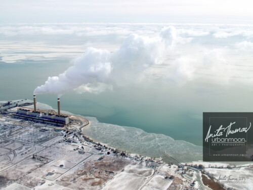 Aerial photography – The Nanticoke Generating Station is the largest coal-fired power plant in North America. Four of its eight units have been shut down, and the remaining units will phase out the use of coal by the end of 2013. This is a view on a very frosty winter day, -30C at our altitude.
© Anita Thomas - Urbanmoon. All Rights Reserved. aerial industrial nanticoke
