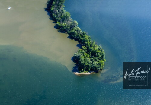 Aerial photography - Hamilton, Ontario. One of the many beautiful spots in the Burlington and Hamilton area. This is off Woodland Cemetery in Burlington Bay.
(C)Anita Thomas All Rights Reserved. aerial photography of a peninsula in the bay