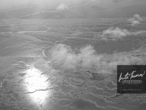 Aerial photography - Aerial photography of Lake Erie in winter. The sun glares off of frozen Lake Erie and its snow drifts on a cold -30C winter's day.
(C)Anita Thomas All Rights Reserved. aerial photography of lake erie in winter