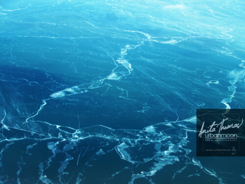 Aerial photography - Frozen Lake Erie appears as marble from 10,000 feet.
(C)Anita Thomas All Rights Reserved. aerial photography of lake erie in winter