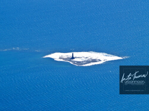 Aerial photography - A light house on Mohawk Island on Lake Erie in Southern Ontario, Canada during winter.
(C)Anita Thomas All Rights Reserved. aerial photography of mohawk island