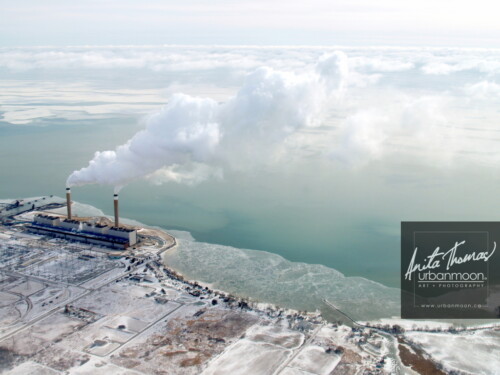 Aerial photography - Seen on this very cold, -30C winter's day, is the Nanticoke Generating Station, the largest coal-fired power plant in North America, located in Nanticoke, Ontario, Canada.
(C)Anita Thomas All Rights Reserved. aerial photography of nanticoke