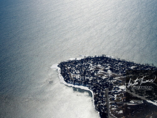Aerial photography - Peacock Point on a glistening Lake Erie, in Southern Ontario, Canada during winter.
(C)Anita Thomas All Rights Reserved. aerial photography of peacock point ontario