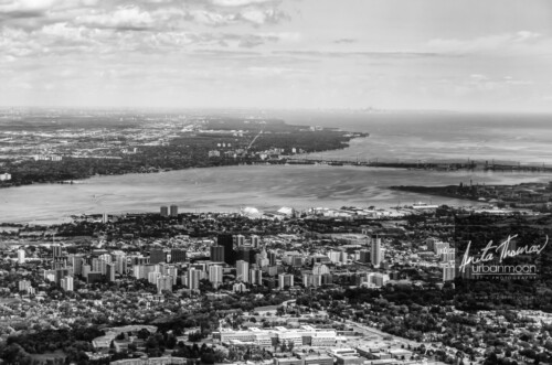 Aerial photography - The City of Hamilton sits on the edge of Lake Ontario in Ontario, Canada. Burlington is just the other side of the bay, Toronto can be seen in the distance.
(C)Anita Thomas All Rights Reserved. aerial photography of the city of hamilton