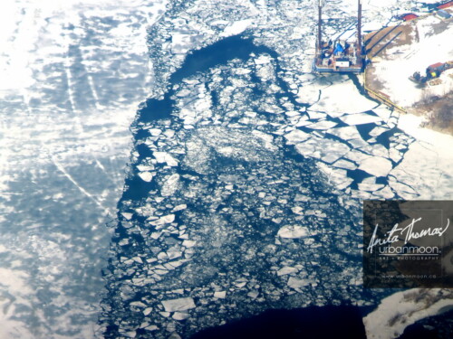Aerial photography - The Grand River with broken ice during winter in Southern, Ontario, Canada
(C)Anita Thomas All Rights Reserved. aerial photography of the grand river