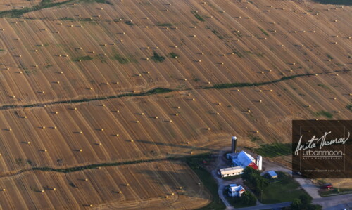 Aerial photography - Farmland, rural.
© Anita Thomas - Urbanmoon. All Rights Reserved. agriculture bales in fields