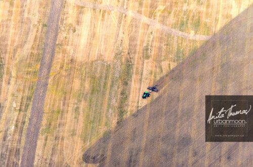Aerial photography - Farmland, rural.
© Anita Thomas - Urbanmoon. All Rights Reserved. agriculture tractor in a field
