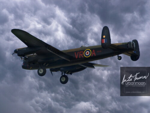 Aviation photography - The Avro Lancaster Mk. X of the Canadian Warplane Heritage Museum in Hamilton, Ontario flies past. It is one of only two remaining flying Lancs.
© Anita Thomas - Urbanmoon. All Rights Reserved. avro lancaster mk x