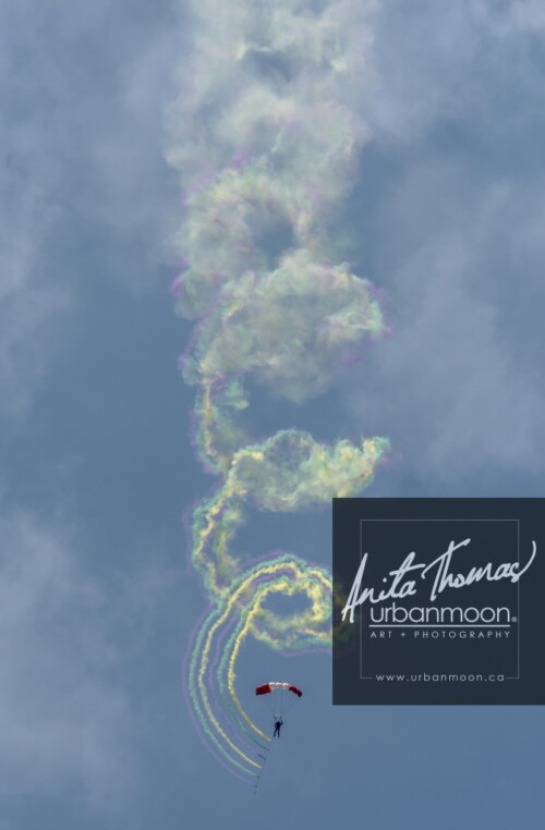 Aviation photography - The CAF SkyHawks are Canada's only military parachute demonstration team. Supported by the Canadian Army, the SkyHawks are based out of Trenton, Ontario, at the Canadian Army Advanced Warfare Centre. There, they train alongside soldiers who held defend our country and sovereignty through a wide variety of domestic and overseas missions. For over 40 years, the SkyHawks have represented Canada and the Canadian Armed Forces to over 75 million spectators worldwide under our signature Canadian flag parachutes. Bringing their parachutes in close proximity to build picturesque formations in the sky, the team puts on a spectacular show. Performing these aerobatoic parachute formations requires a high level of skill and courage, known as Canopy Relative Work. It's with great pride that they continue to showcase the professionalism, dedication and team work it takes to be part of the Canadian Armed Forces.   (Source: https://mbairshow.ca/)
© Anita Thomas - Urbanmoon. All Rights Reserved. canadian armed forces skyhawks parachute team