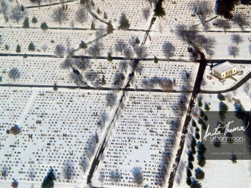Aerial photography - Gravestones dot the white landscape of of a graveyard in Stratford, Ontario, Canada.
(C)Anita Thomas All Rights Reserved. cemetery in stratford