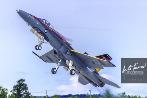 Aviation photography - Captain Ryan Kean pilots the CF-18 Hornet at the Brantford Rotary airshow. The 2016 paint theme celebrates the 75th anniversary of the British Commonwealth Air Training Plan.
© Anita Thomas - Urbanmoon. All Rights Reserved. cf hornet