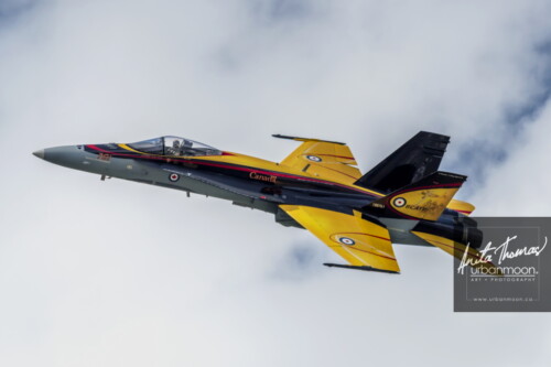 Aviation photography - Captain Ryan Kean pilots the CF-18 Hornet at the Brantford Rotary airshow. The 2016 paint theme celebrates the 75th anniversary of the British Commonwealth Air Training Plan.
© Anita Thomas - Urbanmoon. All Rights Reserved. cf hornet