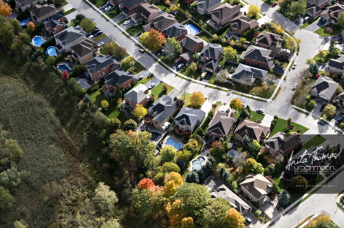 Aerial photography - Closely built houses in a suburban neighborhood 
(C)Anita Thomas All Rights Reserved. closely built houses in the suburbs