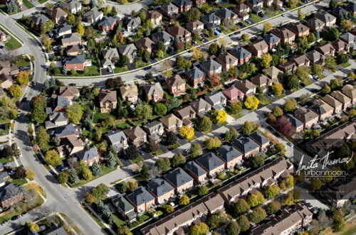Aerial photography - Closely built houses in a suburban neighborhood 
(C)Anita Thomas All Rights Reserved. closely built houses in the suburbs