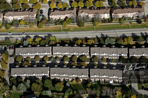 Aerial photography - Closely built houses in a suburban neighborhood 
(C)Anita Thomas All Rights Reserved. closely built houses in the suburbs