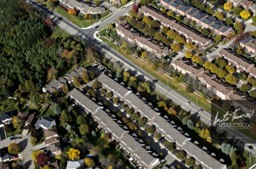 Aerial photography - Closely built houses in a suburban neighborhood 
(C)Anita Thomas All Rights Reserved. closely built houses in the suburbs