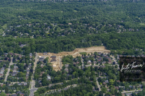 Aerial photography - Forests clear-cut for more homes to be built.
(C)Anita Thomas All Rights Reserved. suburban houses aerial photography