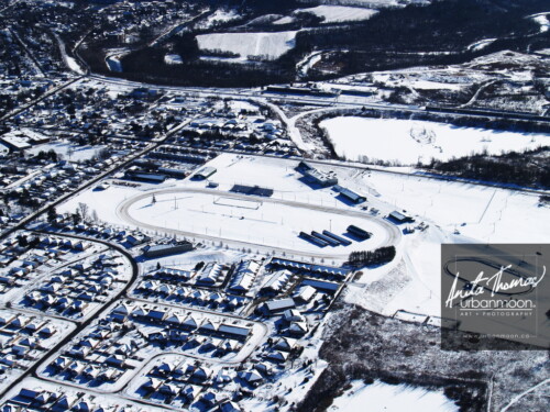 Aerial photography - Paris Fair Grounds during winter, in Paris, Ontario, Canada.
(C)Anita Thomas All Rights Reserved. suburban houses aerial photography