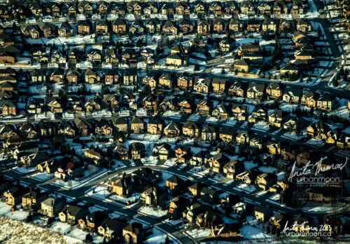 Aerial photography - Rooftops upon rooftops are seen in this winter aerial photo of a suburban neighbourhood of Hamilton, Ontario in Canada.
(C)Anita Thomas All Rights Reserved. the suburban dream