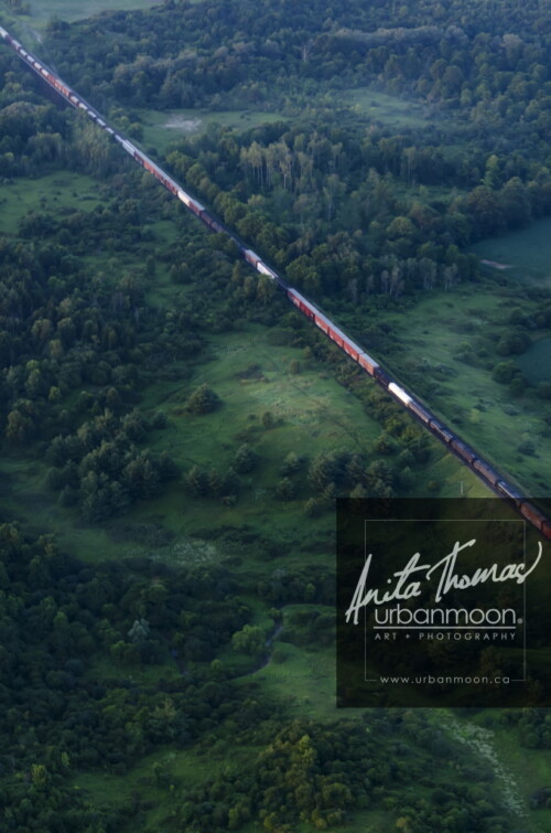 Aerial photography of rural Southern Ontario.
© Anita Thomas - Urbanmoon. All Rights Reserved. train in rural southern ontario