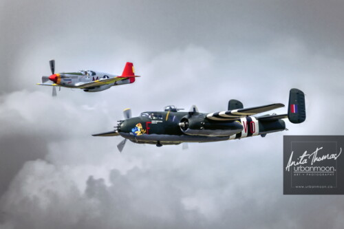 Aviation photography - Tuskegee North American P-51C Mustang and the North American B-25J Mitchell Mk. III of the Canadian Warplane Heritage Museum in Hamilton, Ontario
520040
© Anita Thomas - Urbanmoon. All Rights Reserved. tuskegee p c mustang and the b j mitchell