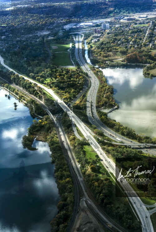 Aerial photography - The Dundurn area of Hamilton with Cootes Paradise, Lake Ontario, Highway 403, York Blvd, the rail line and more, all being danced upon by the beautiful light and clouds.
© Anita Thomas - Urbanmoon. All Rights Reserved. aerial of cootes paradise in hamilton ontario
