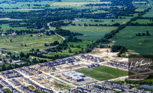 Aerial photography - New housing development spreading into rural farmland
© Anita Thomas - Urbanmoon. All Rights Reserved. aerial photography of urban sprawl