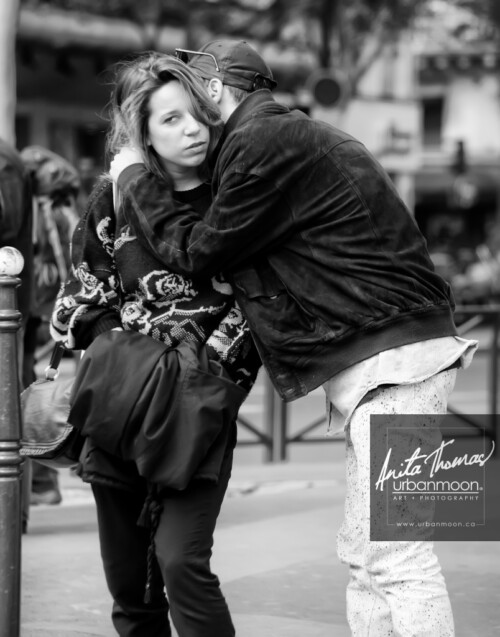 Urban photography - Paris, France
© Anita Thomas - Urbanmoon Photography. All Rights Reserved. street photography man whispers in woman ear