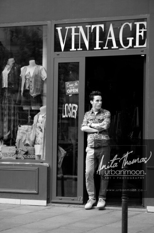 Urban photography - Paris, France
© Anita Thomas - Urbanmoon Photography. All Rights Reserved. street photography shopkeeper outside his store