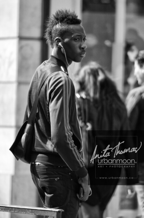 Urban photography - Paris, France
© Anita Thomas - Urbanmoon Photography. All Rights Reserved. street photography stylish young man listening with earbuds